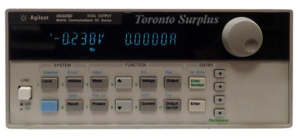 a  15V,   3A HP 66309D / Agilent 66309D Dual Mobile Communications DC Source w/ DVM 0-15 V, 0-3 A